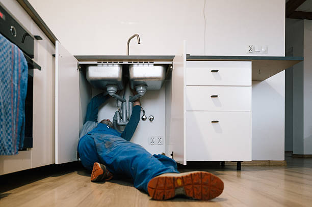 Professional Emergency Plumber technician working in Iron Station, NC